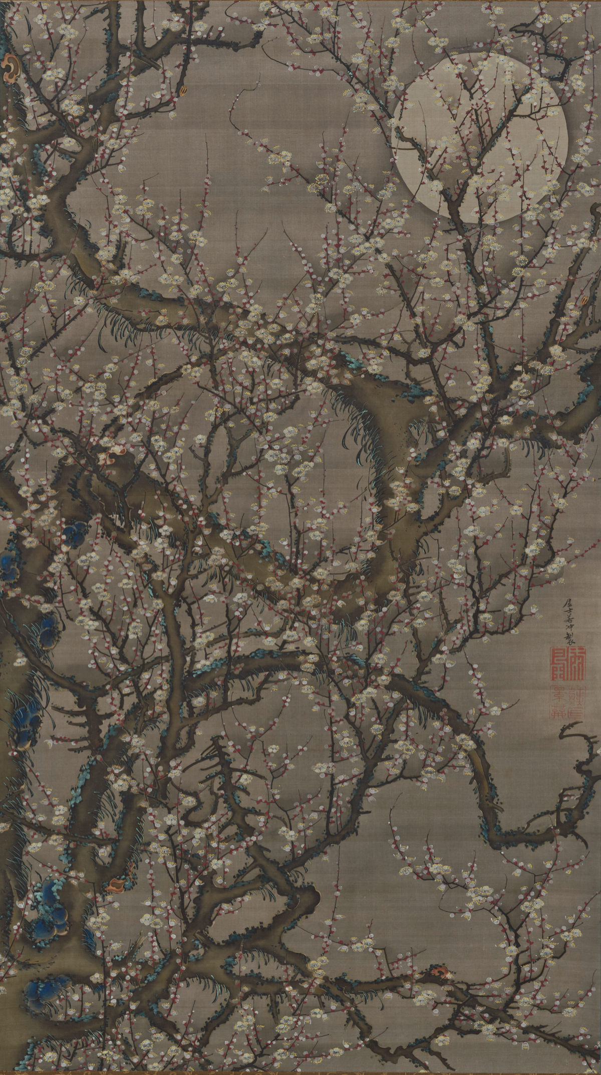 Blossoming plum under the moon